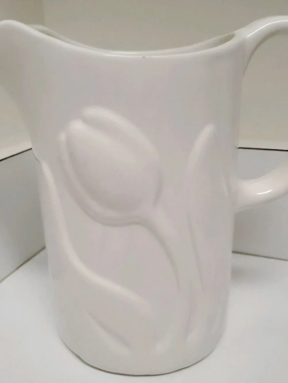 White Stoneware 24 Oz Pitcher Embossed Tulips 9